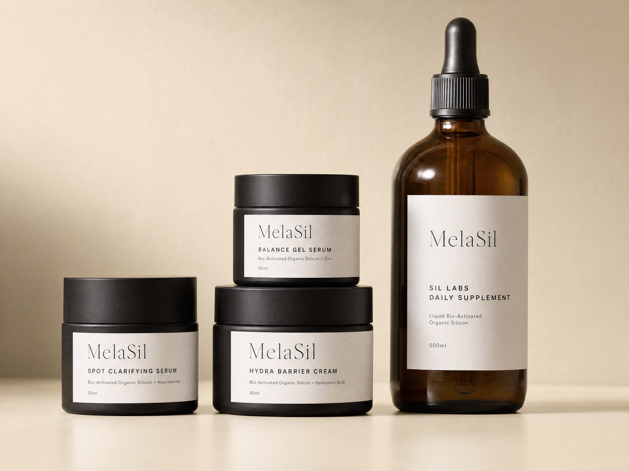 The MelaSil range: Spot Clarifying Serum, Balance Gel Serum, Hydra Barrier Cream and SIL Labs Daily Supplement on a warm ivory ground